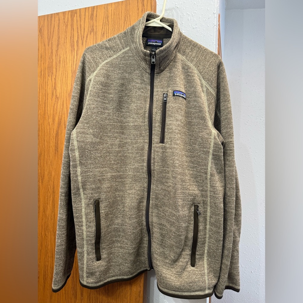 Men’s zip up Patagonia sweater. Brown and tan color, only worn a few times.